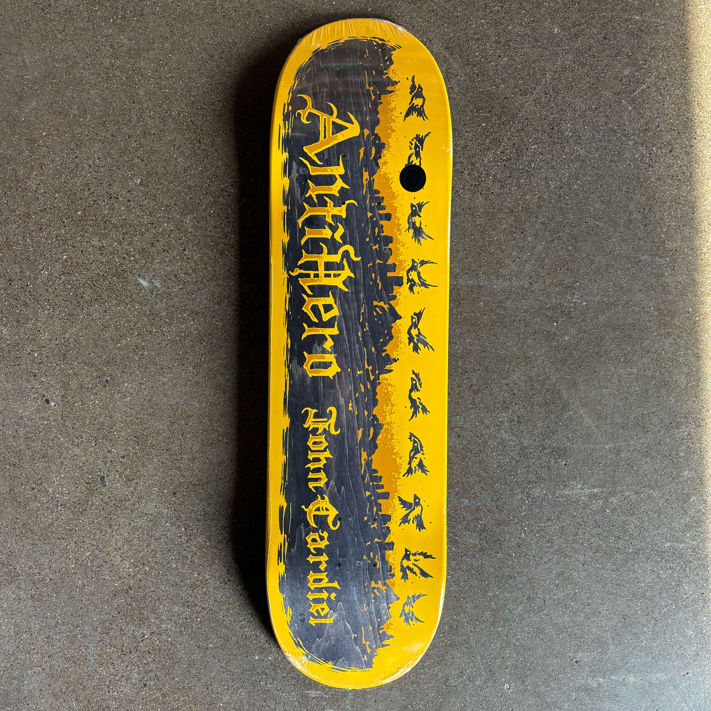 Full image of yellow deck with wood veneer exposed.